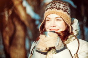 woman holding mug